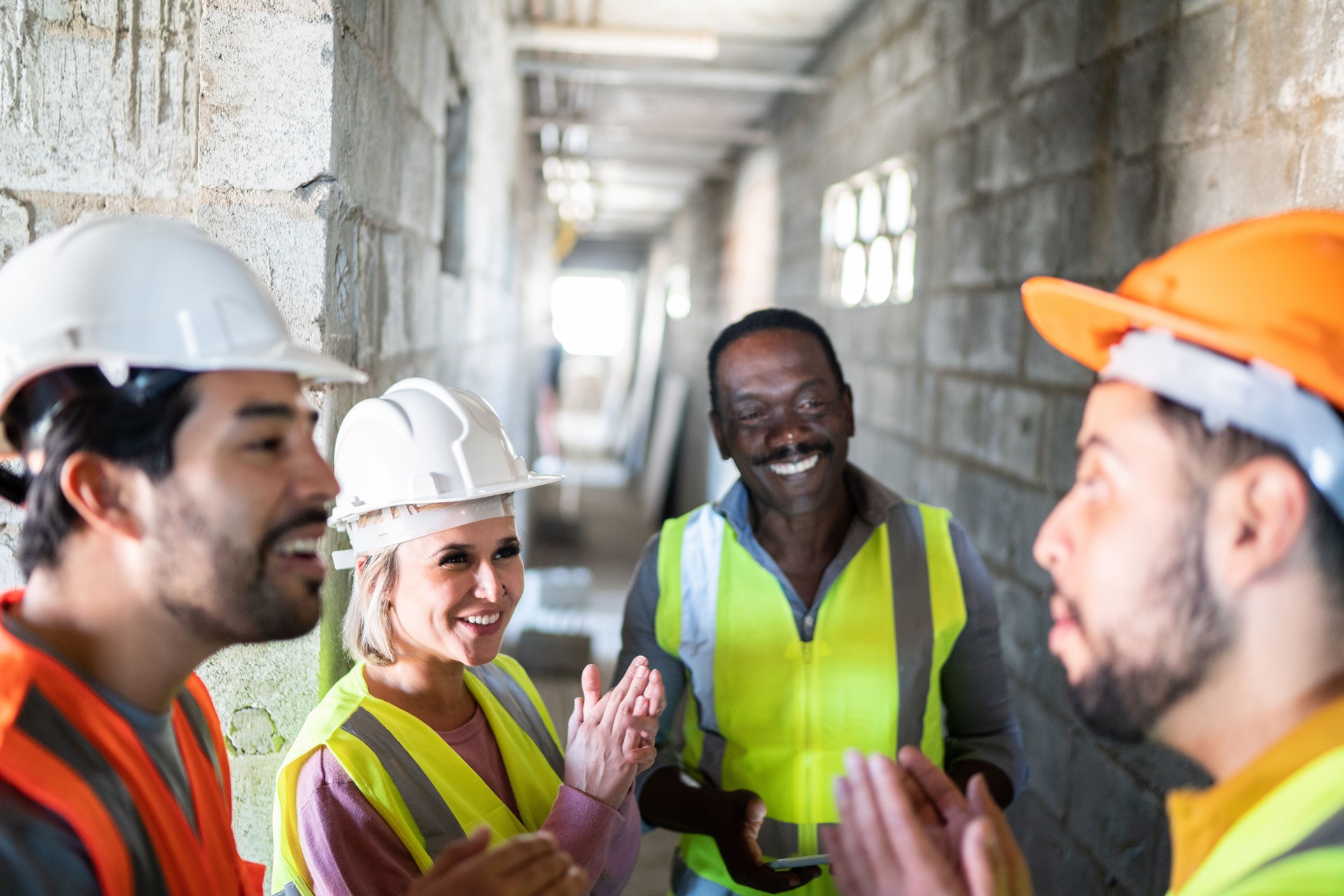 Construction workers doing a meeting in a construction site